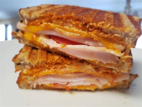 How does Toasted Turkey and Roasted Red Pepper Panini fit into your Daily Goals - calories, carbs, nutrition