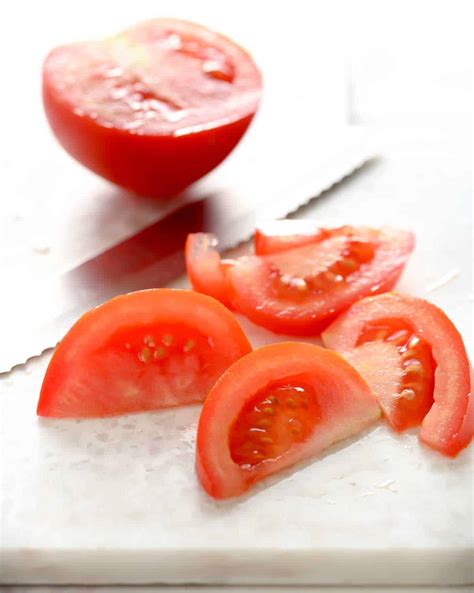 How does Tomato 6x6 Wedge Cut 6 Halved 1 oz fit into your Daily Goals - calories, carbs, nutrition