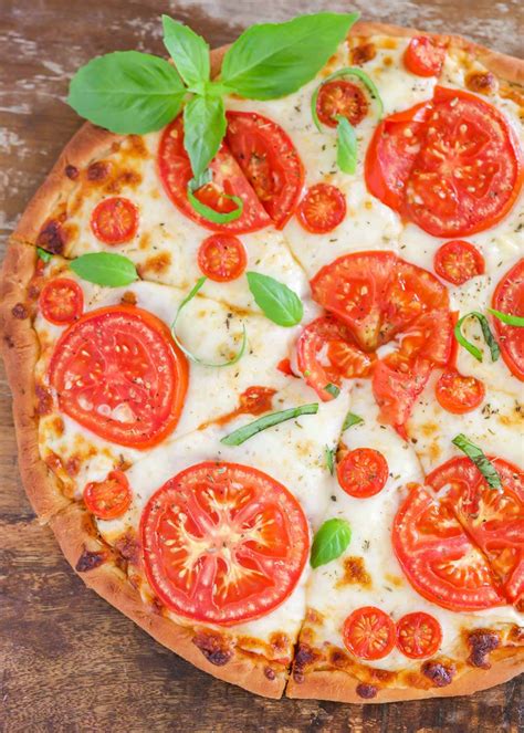 How does Tomato Basil Pizza fit into your Daily Goals - calories, carbs, nutrition