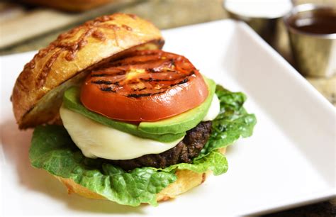 How does Tomato Mozzarella Angus Burger fit into your Daily Goals - calories, carbs, nutrition