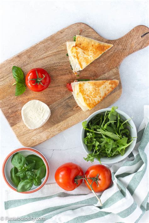 How does Tomato Mozzarella Wrap fit into your Daily Goals - calories, carbs, nutrition