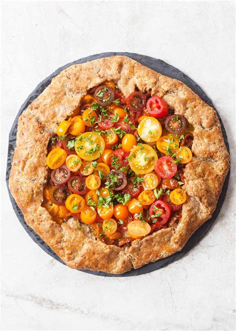 How does Tomato Parmesan Pizza Wheat Crust fit into your Daily Goals - calories, carbs, nutrition