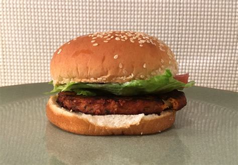 How does Tomato and Basil Pizza Burger fit into your Daily Goals - calories, carbs, nutrition