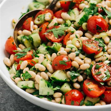 How does Tomato and White Bean Salad 3 oz fit into your Daily Goals - calories, carbs, nutrition