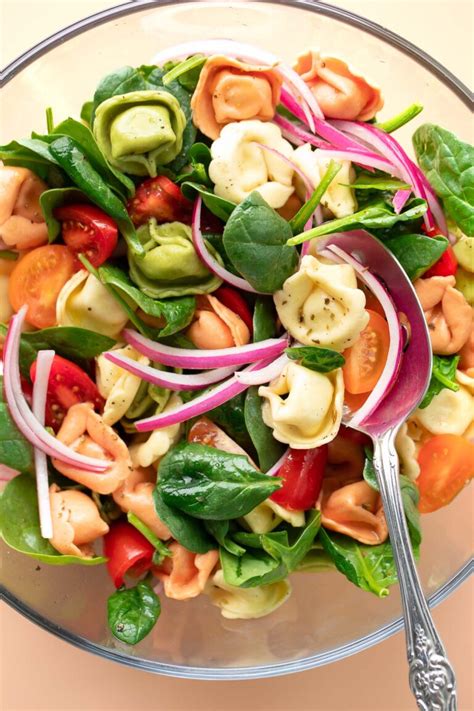 How does Tortellini and Spinach Salad fit into your Daily Goals - calories, carbs, nutrition