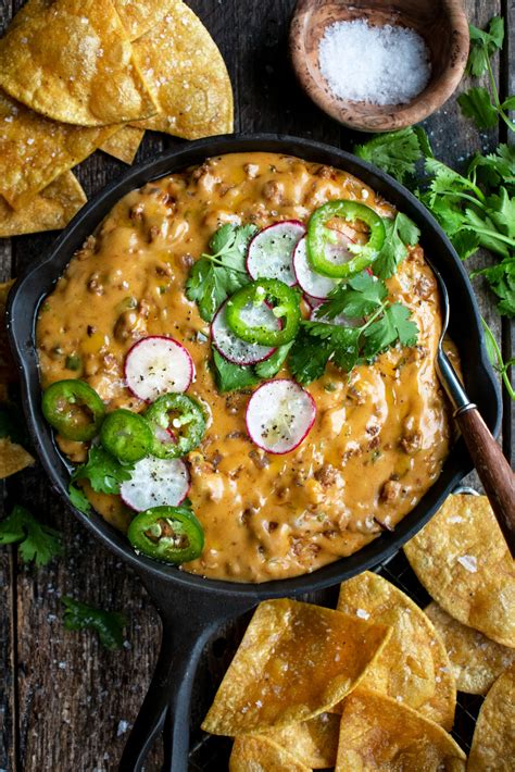 How does Tortilla Chips CONV Chorizo Con Queso Dip fit into your Daily Goals - calories, carbs, nutrition