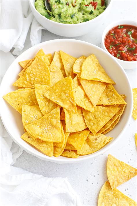 How does Tortilla Chips Yellow Baked 1 oz fit into your Daily Goals - calories, carbs, nutrition