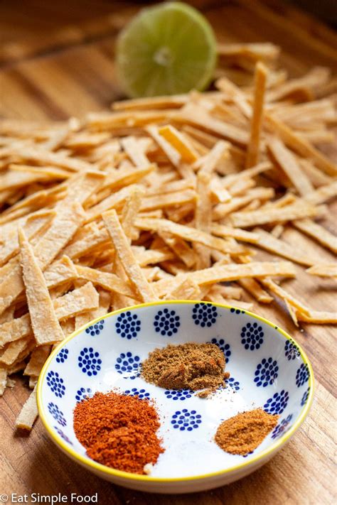 How does Tortilla Strips Baked 2 Tbsp fit into your Daily Goals - calories, carbs, nutrition