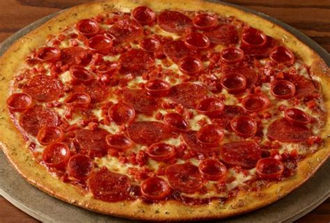 How does Triple Cheese and Pepperoni Pizza fit into your Daily Goals - calories, carbs, nutrition