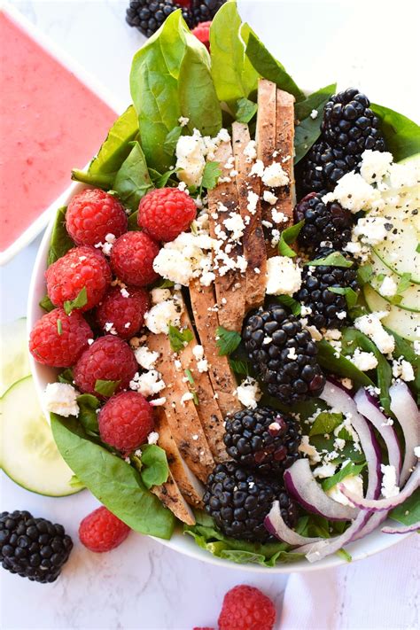 How does Tropical Chicken Salad with Raspberry Vinaigrette fit into your Daily Goals - calories, carbs, nutrition