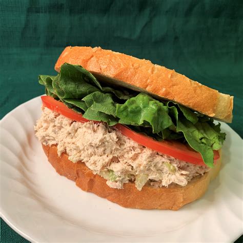 How does Tuna Salad Sandwich on Wheat Bread fit into your Daily Goals - calories, carbs, nutrition