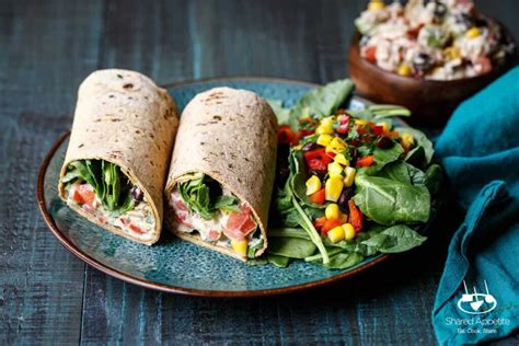 How does Tuna Salad Wrap withTriple Bean Salad fit into your Daily Goals - calories, carbs, nutrition