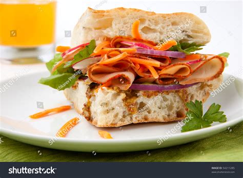 How does Turkey Cheddar Ciabatta Carrots with Broccoli Medley and a Red Apple (70944.71) fit into your Daily Goals - calories, carbs, nutrition