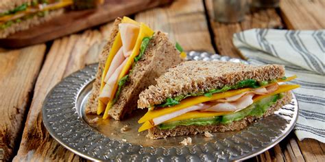 How does Turkey Cheddar Cucumber Sandwich fit into your Daily Goals - calories, carbs, nutrition