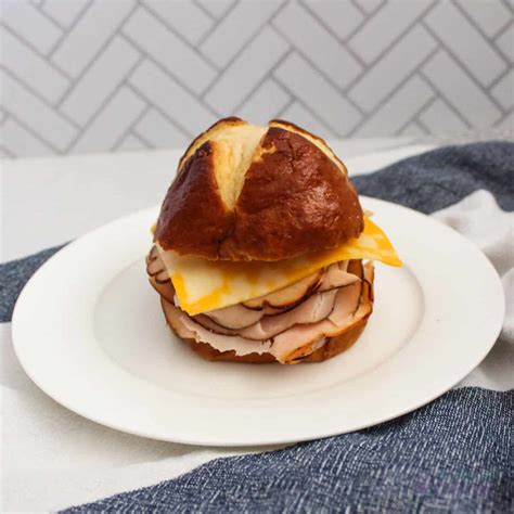 How does Turkey Cheese Pretzel Sandwich fit into your Daily Goals - calories, carbs, nutrition