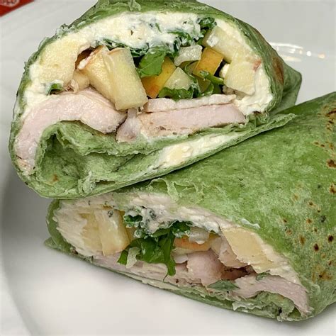 How does Turkey and American Cheese Wrap withCole Slaw fit into your Daily Goals - calories, carbs, nutrition