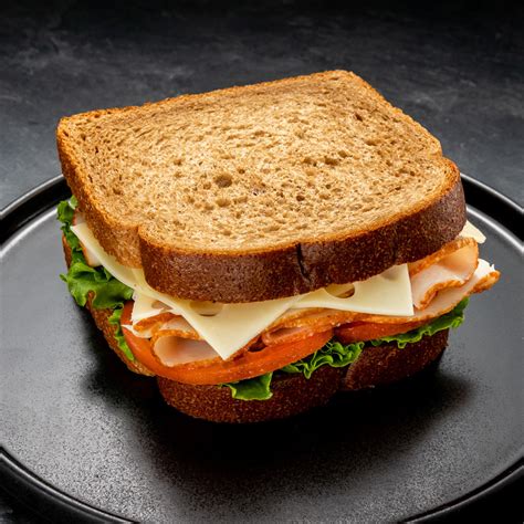 How does Turkey and Cheese Sandwich fit into your Daily Goals - calories, carbs, nutrition