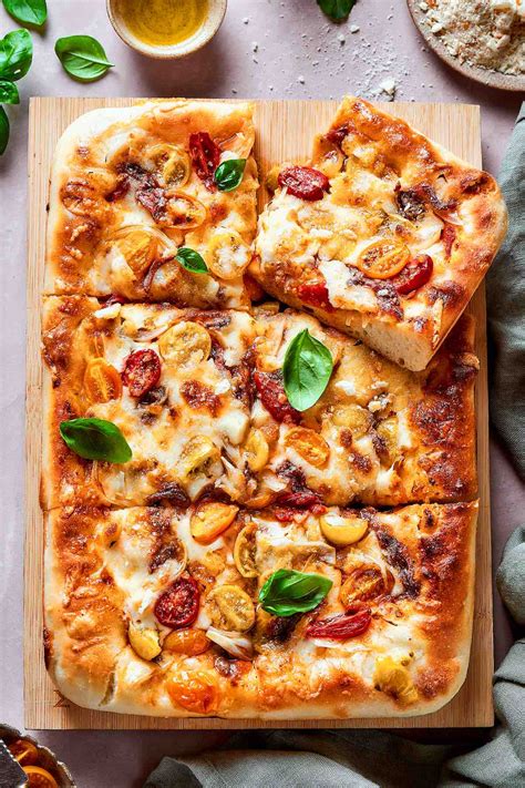 How does Tuscan Chicken Sicilian Pizza fit into your Daily Goals - calories, carbs, nutrition