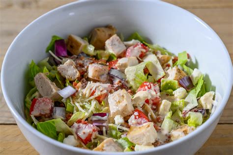 How does Tuscan Chicken Tossed Salad fit into your Daily Goals - calories, carbs, nutrition