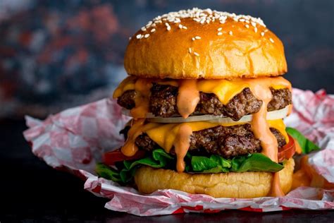 How does Ultimate Double Cheeseburger with Sauce fit into your Daily Goals - calories, carbs, nutrition