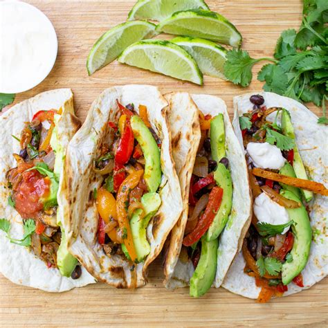 How does Vegetable Fajitas with Rice and lowfat cheese fit into your Daily Goals - calories, carbs, nutrition