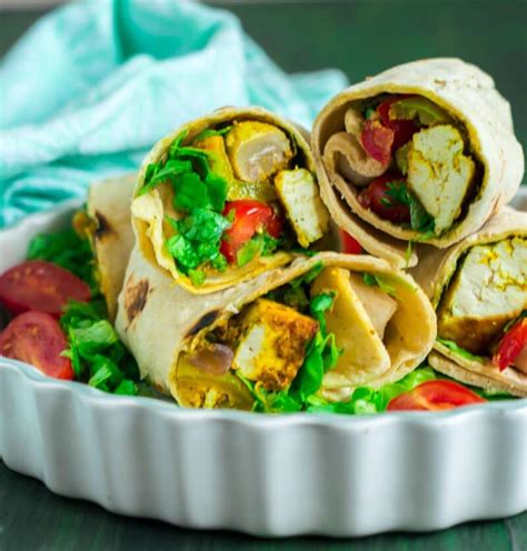 How does Vegetable Tikka Wrap with Mango chutney and salad fit into your Daily Goals - calories, carbs, nutrition