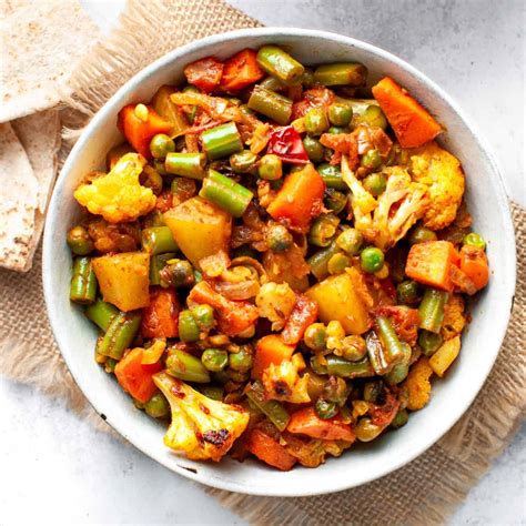 How does Vegetables Sabzi Curry Monsoon 1 Cup fit into your Daily Goals - calories, carbs, nutrition