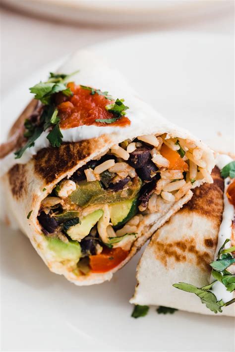 How does Vegetarian Burrito Plate fit into your Daily Goals - calories, carbs, nutrition