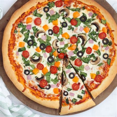 How does Vegetarian Pizza, Personal Size fit into your Daily Goals - calories, carbs, nutrition