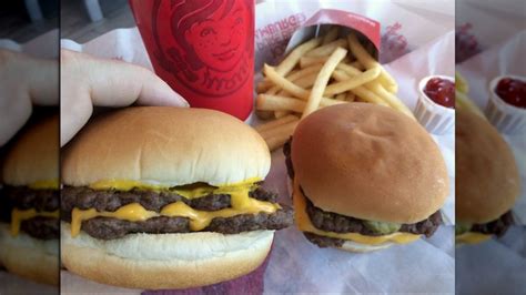 How does WENDY'S, Double Stack, with cheese fit into your Daily Goals - calories, carbs, nutrition