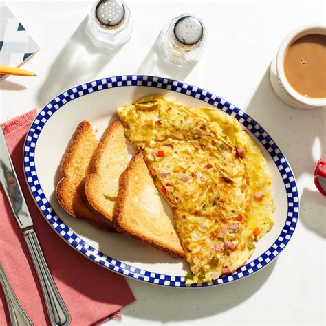 How does Western Omelet with Toast fit into your Daily Goals - calories, carbs, nutrition