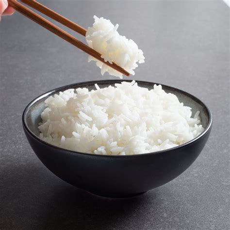 How does White Rice Steamed fit into your Daily Goals - calories, carbs, nutrition