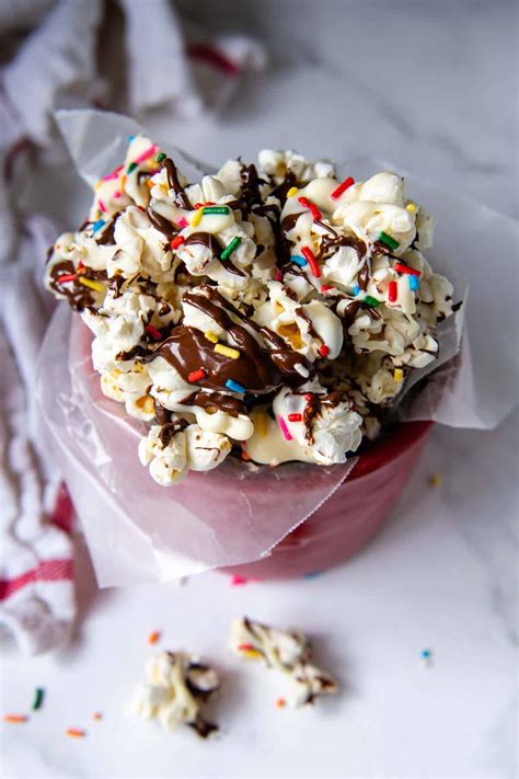 How does White and Dark Chocolate Drizzled Popcorn fit into your Daily Goals - calories, carbs, nutrition