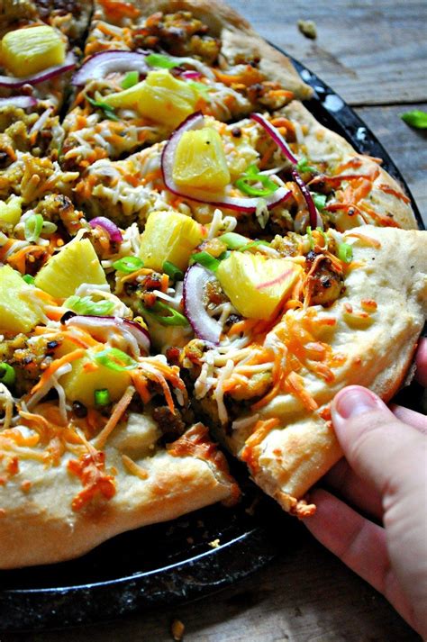 How does Whole Wheat Caribbean Jerk Pizza fit into your Daily Goals - calories, carbs, nutrition