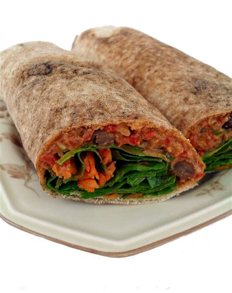 How does Wrap Mahammara Feta & Vegetables Spinach Tortilla fit into your Daily Goals - calories, carbs, nutrition