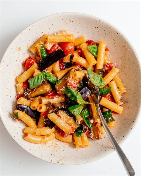 How does Ziti-Marinated Tomato Eggplant Pasta fit into your Daily Goals - calories, carbs, nutrition