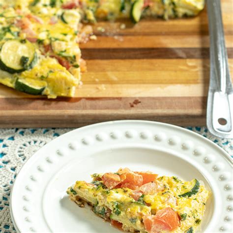 How does Zucchini, Tomato and Feta Omelet fit into your Daily Goals - calories, carbs, nutrition