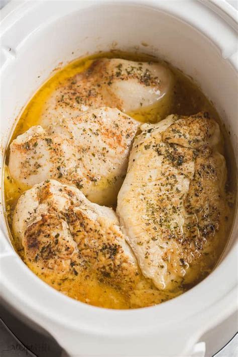 How long does it take to cook frozen chicken breasts in a slow cooker?
