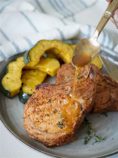 How many calories are in apple smoked pork chops with dijon-bourbon glaze, baked sweet potato fries and braised kale - calories, carbs, nutrition