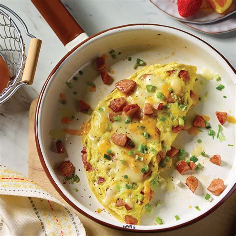 How many calories are in cheddar omelet + maple sausage - calories, carbs, nutrition