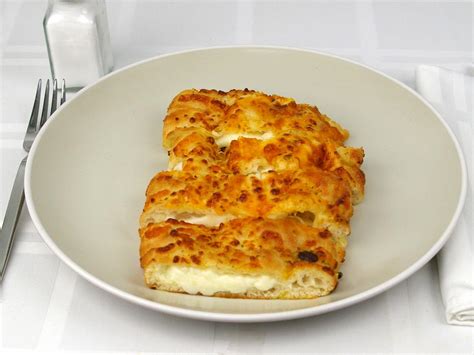 How many calories are in cheesy breadsticks (16121.6) - calories, carbs, nutrition