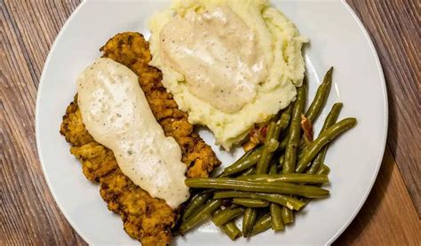 How many calories are in chicken fried steak, with smashed potatoes green beans - calories, carbs, nutrition