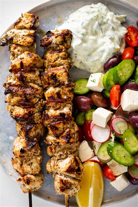 How many calories are in combo chicken souvlaki zucchini pancakes orzo salad tzatziki sauce - calories, carbs, nutrition