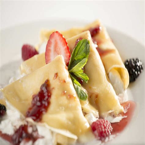 How many calories are in crepes with a berry blend sauce and orange scented ricotta (117306.0) - calories, carbs, nutrition