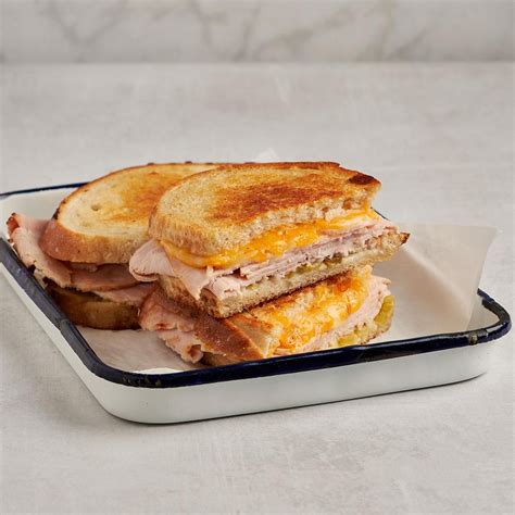 How many calories are in grilled turkey melt, on white - calories, carbs, nutrition