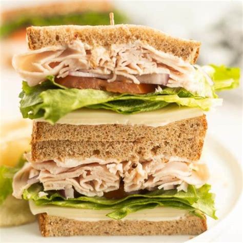 How many calories are in ham-turkey swiss mini sub with side salad - calories, carbs, nutrition
