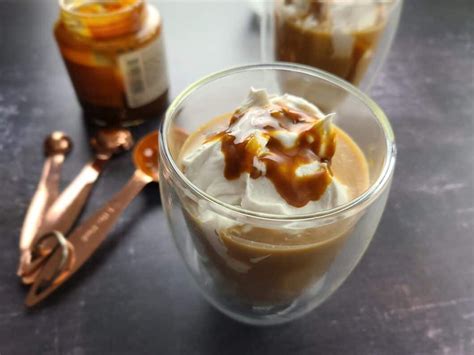 How many calories are in iced dulce de leche latte - tall - whole milk - with whipped cream - calories, carbs, nutrition