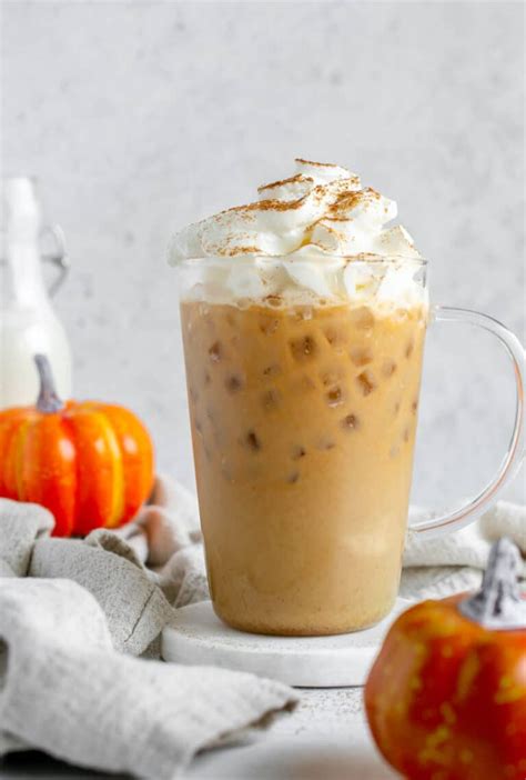 How many calories are in iced pumpkin spice latte - grande - whole milk - with whipped cream - calories, carbs, nutrition
