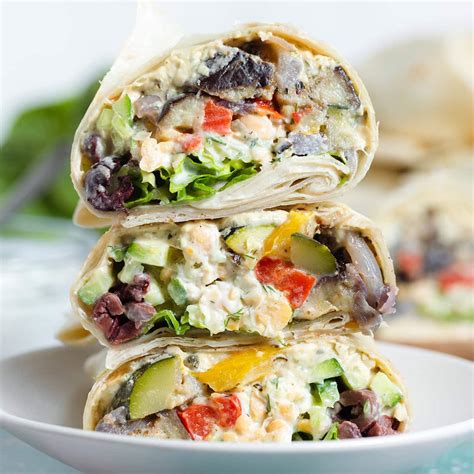 How many calories are in mediterranean vegetable wrap served with peppered wedges and side salad - calories, carbs, nutrition