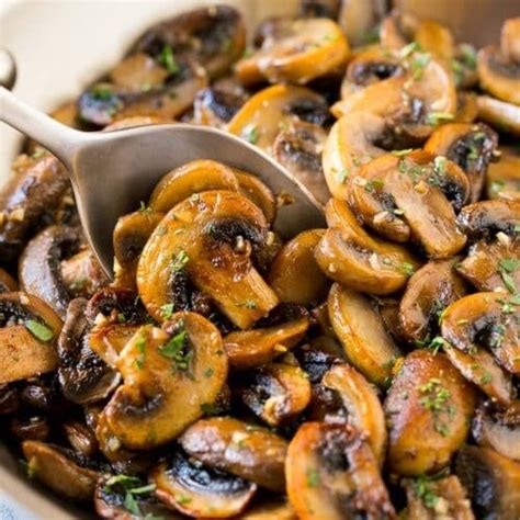 How many calories are in mushroom button sauteed garlic & parsley 2 oz - calories, carbs, nutrition